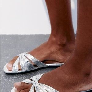Flat metallic sandals